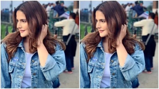 For footwear, Zareen aptly opted for a pair of white sneakers with a black label behind.(Instagram/@zareenkhan)