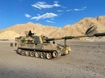 Some 50 PLA personnel are ahead for their positions at patrolling point 15 with an equal number of Indian Army troops facing them at a distance. (ANI Photo) Some 50 PLA personnel are ahead for their positions at patrolling point 15 with an equal number of Indian Army troops facing them at a distance. (ANI Photo)