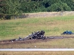 Emergency Response teams work the scene of a fatal small plane crash at DeKalb-Peachtree Airport, Georgia on Friday, Oct. 8, 2021,
