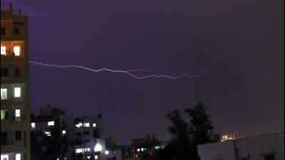 Lightning in the sky seen during rain at Sutarwadi in Pune, on Saturday. Heavy rainfall within short span of time crippled normal life in many areas of the city, resulting in waterlogging, water entering into housing societies and inundation. (HT) Lightning in the sky seen during rain at Sutarwadi in Pune, on Saturday. Heavy rainfall within short span of time crippled normal life in many areas of the city, resulting in waterlogging, water entering into housing societies and inundation. (HT)