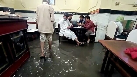 A restaurant is waterlogged after the rainwater enters inside following incessant rainfall, in Hyderabad on October 9.(ANI)