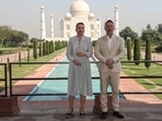 Denmark's Prime Minister Mette Frederiksen (L) poses for pictures along with her husband as they visit the Taj Mahal in Agra on October 10, 2021. (Photo by Pawan SHARMA / AFP)(AFP) Denmark's Prime Minister Mette Frederiksen (L) poses for pictures along with her husband as they visit the Taj Mahal in Agra on October 10, 2021. (Photo by Pawan SHARMA / AFP)(AFP)