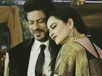 Shah Rukh Khan and Rekha at an event. Shah Rukh Khan and Rekha at an event.