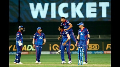 Axar Patel of Delhi Capitals celebrates the wicket of AB de Villiers of Royal Challengers Bangalore during the Indian Premier League cricket match between Royal Challengers Bangalore and Delhi Capitals, at the Dubai International Stadium in Dubai on Friday. (PTI) Axar Patel of Delhi Capitals celebrates the wicket of AB de Villiers of Royal Challengers Bangalore during the Indian Premier League cricket match between Royal Challengers Bangalore and Delhi Capitals, at the Dubai International Stadium in Dubai on Friday. (PTI)