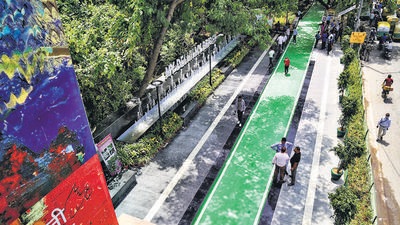 New Delhi, India - August 14, 2021: A view of a cycle track, part of the pilot project of redesigning the city roads on the line of European standards at Chirag Delhi-Sheikh Sarai stretch, in New Delhi, India, on Saturday, August 14, 2021. (Photo by Sanchit Khanna/ Hindustan Times)