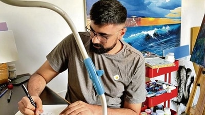 Mr Raj, 30, is sketching something straightforwardly relatable—the Majnu Ka Tila gateway in the north of the city. Mr Raj, 30, is sketching something straightforwardly relatable—the Majnu Ka Tila gateway in the north of the city.