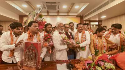 BKU leader Raju Ahlawat and others joining the BJP in Lucknow on Sunday. (PTI Photo) BKU leader Raju Ahlawat and others joining the BJP in Lucknow on Sunday. (PTI Photo)