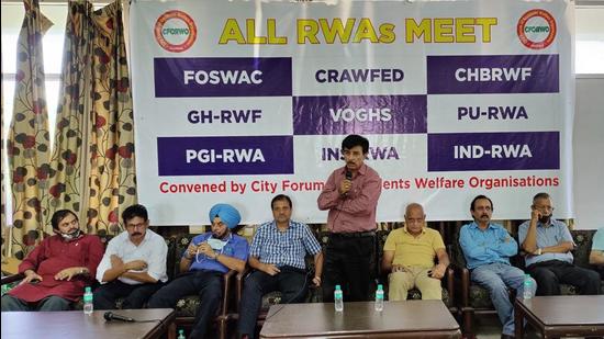 City Forum of Resident Welfare Organisations convener Vinod Vashisht addressing a meeting of various RWA federations in Chandigarh on Sunday. (HT Photo)