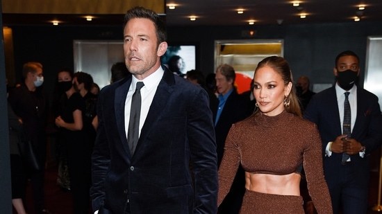 Actors Ben Affleck and Jennifer Lopez walked hand in hand as they arrived for the premiere of The Last Duel at Rose Theater at Jazz in New York on Saturday. (Photo by Evan Agostini/Invision/AP)(Evan Agostini/Invision/AP)