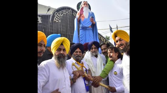Shiromani Akali Dal president Sukhbir Singh Badal and others in Amritsar on Sunday.