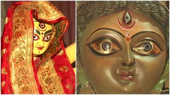 Idol with gold eyes and designer saree: Two idols have been set up in Bandhu Mahal Club in Baguiati in which one has been installed with eyes of gold and another has been draped in gold embroidered saree that costs <span class='webrupee'>₹</span>1.5 lakh.(ANI)