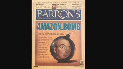 Jeff Bezos posted this old newspaper clipping that prompted Elon Musk to reply. (Twitter/@JeffBezos)