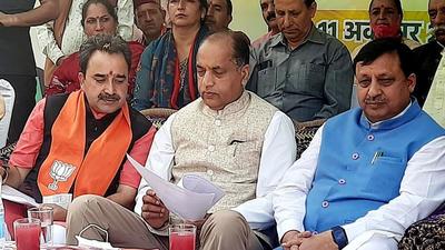 Himachal chief minister Jai Ram Thakur and BJP’s Arki candidate Ratan Pal Singh during an election campaign on Monday. (HT Photo) Himachal chief minister Jai Ram Thakur and BJP’s Arki candidate Ratan Pal Singh during an election campaign on Monday. (HT Photo)