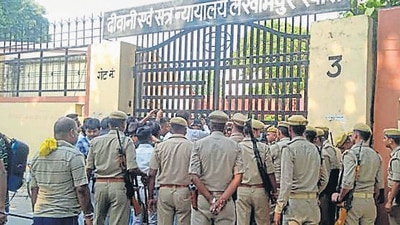 Police personnel outside the court in Lakhimpur Kheri. (HT Photo) Police personnel outside the court in Lakhimpur Kheri. (HT Photo)