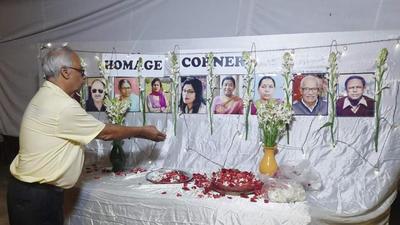 A man pays homage to members who died due to Covid at a Durga Puja pandal in Lucknow. (SOURCED IMAGE )