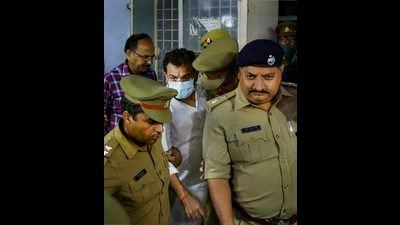 Union Minister of State for Home Ajay Misra's son Ashish Mishra being taken from crime branch office to be produced before magistrate, in Lakhimpur Kheri on Saturday (PTI) Union Minister of State for Home Ajay Misra's son Ashish Mishra being taken from crime branch office to be produced before magistrate, in Lakhimpur Kheri on Saturday (PTI)