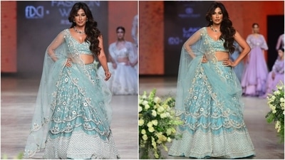 Chitrangada Singh walked the ramp on day 5 of Lakme Fashion Week for designer duo Shikha and Srishti's latest collection Prakriti. She wore a heavily embroidered pastel blue lehenga set teamed with a plunging-neckline choli and zari dupatta. She wore the ensemble with minimal jewels and open tresses. Chitrangada Singh walked the ramp on day 5 of Lakme Fashion Week for designer duo Shikha and Srishti's latest collection Prakriti. She wore a heavily embroidered pastel blue lehenga set teamed with a plunging-neckline choli and zari dupatta. She wore the ensemble with minimal jewels and open tresses.