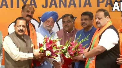 Devender Rana and Surjit Silothia join the BJP in presence of Union ministers on Monday. (ANI Photo)