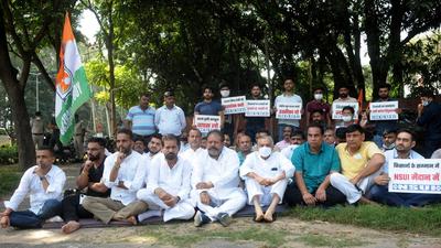 The Chandigarh Congress led by national treasurer Pawan Kumar Bansal sat on a “maun vrat” outside the Punjab Raj Bhawan. The Chandigarh Congress led by national treasurer Pawan Kumar Bansal sat on a “maun vrat” outside the Punjab Raj Bhawan.