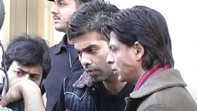 Karan Johar and Shah Rukh Khan on the set of Kabhi Alvida Naa Kehna. Karan Johar and Shah Rukh Khan on the set of Kabhi Alvida Naa Kehna.