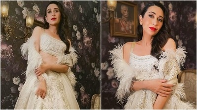 Karisma Kapoor transforms into a modern bride in white chikankari lehenga and bold red lips (Instagram/@eshaamiin1) Karisma Kapoor transforms into a modern bride in white chikankari lehenga and bold red lips (Instagram/@eshaamiin1)