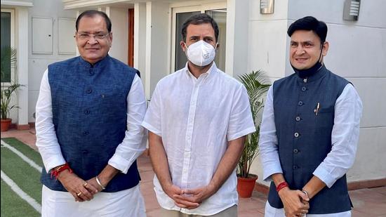 Congress leader Rahul Gandhi welcomes Yashpal Arya and Sanjeev Arya into the Congress party in New Delhi. (PTI Photo)