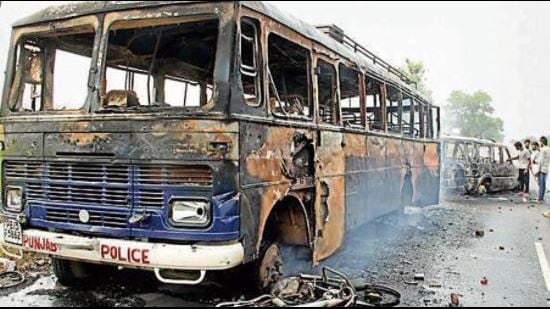 A police vehicle torched in anti-Bargari sacrilege protests in Faridkot district in 2015. Punjab Police personnel were accused of opening fire on Sikh protesters.