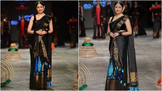 Divya Khosla Kumar became a muse for designer Sanjukta Dutta on the last day of Lakme Fashion Week. She wore a silk embroidered black saree and styled it with gajra, bangles, gold matha patti, sleeveless blouse and minimal make-up.