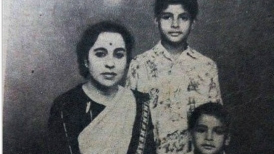 Amitabh Bachchan poses with mother Teji Bachchan and younger brother Ajitabh Bachchan for a family portrait. 
