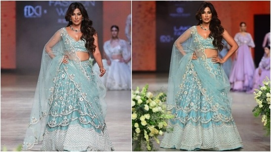 Chitrangada Singh walked the ramp on day 5 of Lakme Fashion Week for designer duo Shikha and Srishti's latest collection Prakriti. She wore a heavily embroidered pastel blue lehenga set teamed with a plunging-neckline choli and zari dupatta. She wore the ensemble with minimal jewels and open tresses.