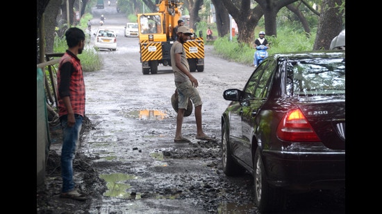 The development, which marks the second time this year that BMC has issued a tender for revamping the Aarey main road, has sparked the ire of environmentalists, who maintain that such infrastructure expansion can be ecologically detrimental to the area. (HT PHOTO)