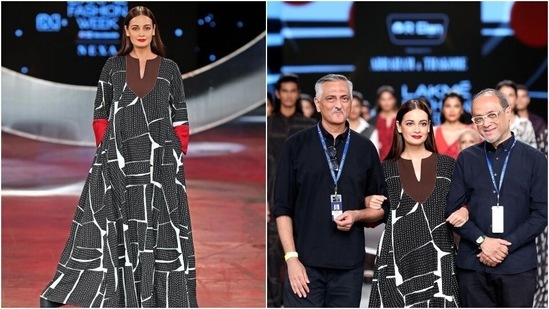 New mom Dia Mirza turned showstopper for designer duo Abraham & Thakore. She celebrated sustainable fashion in a long black and white patchwork dress with a brown collar and red cuffs. Her dress was made from recycled material.