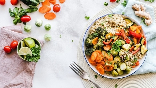 Fill up on healthy stuff first: You can reduce the number of calories you consume by eating more leafy greens like spinach, lettuce, fruits, vegetables, complex carbs including oatmeal, quinoa, barley, legumes, and rice, foods high in omega-3 fatty acids like salmon, chia seeds, lean proteins such as chicken breast, cottage cheese, and a fewer sugar-sweetened products and beverages, processed meats, and fried food.(Pexels)