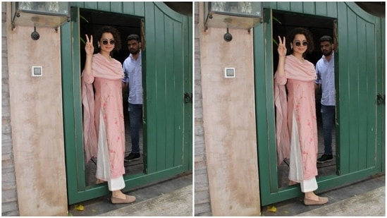 Kangana posed for the cameras. She teamed her look with tinted shades and nude ballerinas.(HT Photos/Varinder Chawla)