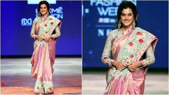 Taapsee Pannu walked the ramp for designer Gaurang Shah at Lakme Fashion Week, showcasing his latest Chand collection. She looked breathtaking in a mint and purple Jamdani sari adorned with floral motifs. She styled the six yards with a matching full-sleeved blouse, half-tied tresses, and vintage silver jewellery.