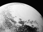 A synthetic perspective view of Pluto, based on high-resolution images from Nasa's New Horizons spacecraft.(Reuters Photo) A synthetic perspective view of Pluto, based on high-resolution images from Nasa's New Horizons spacecraft.(Reuters Photo)