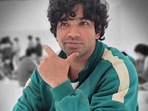 Anupam Tripathi in a still from Squid Game. Anupam Tripathi in a still from Squid Game.