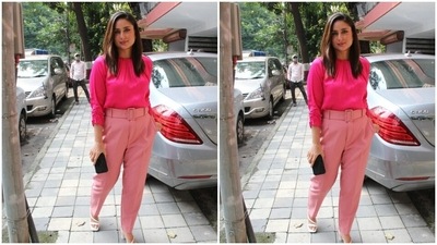 Kareena paired a dark pink full-sleeved silk top with a pair of soft pink formal trousers. (HT Photos/Varinder Chawla) Kareena paired a dark pink full-sleeved silk top with a pair of soft pink formal trousers. (HT Photos/Varinder Chawla)