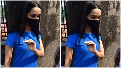 All masked up, Shraddha posed for the cameras. (HT Photos/Varinder Chawla) All masked up, Shraddha posed for the cameras. (HT Photos/Varinder Chawla)