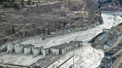 Today, their own district of Chamoli, with its unprecedented glacial avalanche earlier this year, whose flood waters reached right up to Vishnugad – Pipalkoti and destroyed HEP’s just upstream of it (PTI) Today, their own district of Chamoli, with its unprecedented glacial avalanche earlier this year, whose flood waters reached right up to Vishnugad – Pipalkoti and destroyed HEP’s just upstream of it (PTI)