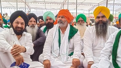 Bharatiya Kisan Union spokesperson Rakesh Tikait with others attend the 'Antim Ardas' of farmers who killed in Lakhimpur Kheri incident. (PTI) Bharatiya Kisan Union spokesperson Rakesh Tikait with others attend the 'Antim Ardas' of farmers who killed in Lakhimpur Kheri incident. (PTI)