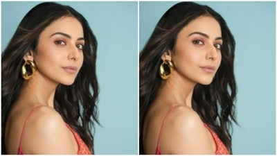 For this photoshoot, Rakul Preet played muse to the designer house Saaksha and Kinni and chose a coral dress from their wardrobe. The midriff-baring floral printed satin dress hugs her body perfectly. (Instagram/@rakulpreet) For this photoshoot, Rakul Preet played muse to the designer house Saaksha and Kinni and chose a coral dress from their wardrobe. The midriff-baring floral printed satin dress hugs her body perfectly. (Instagram/@rakulpreet)