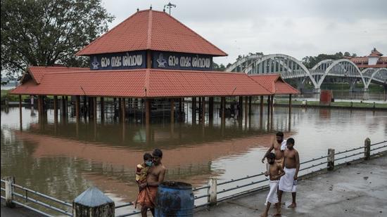 The India Metrological Department (IMD) has issued high alerts as many rivers and dams were filled to the brim. Kerala authorities have shifted people living along river banks and low-lying areas to relief camps. (AP)