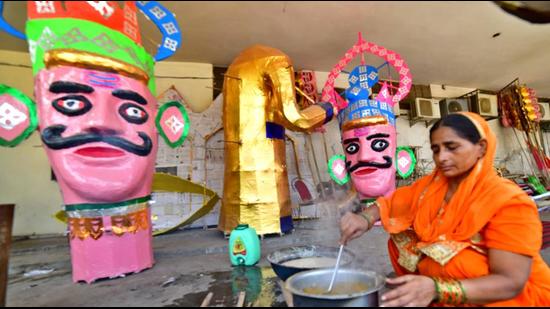Of the 20-member team working on the Ravana effigy at the Daresi Dussehra ground in Ludhiana, 16 are Muslim workmen, and the rest are Hindus. (Gurpreet Singh/HT)