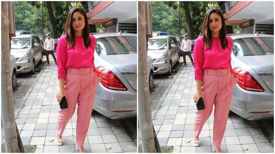 Kareena paired a dark pink full-sleeved silk top with a pair of soft pink formal trousers.(HT Photos/Varinder Chawla)