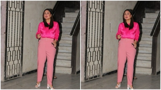 In just eyeliner and a dab of pink lipstick, Kareena posed for the cameras outside her manager’s office. She left her shoulder-length tresses open and opted for white stilettoes to complement her attire.(HT Photos/Varinder Chawla)