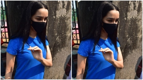 All masked up, Shraddha posed for the cameras.(HT Photos/Varinder Chawla)