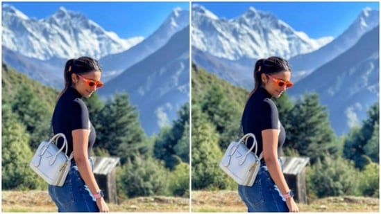 Parineeti, all set for her next shoot schedule, tied her hair back in a ponytail and posed for the cameras. She accessorised her look with tinted shades and a white sling bag across her shoulder.(Instagram/@parineetichopra)