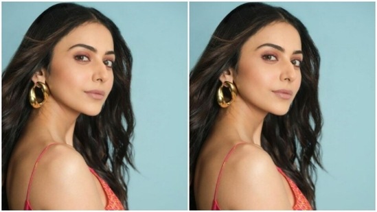 For this photoshoot, Rakul Preet played muse to the designer house Saaksha and Kinni and chose a coral dress from their wardrobe. The midriff-baring floral printed satin dress hugs her body perfectly.(Instagram/@rakulpreet)