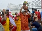 Maha Saptami is an important day since this day marks the beginning of the Maha Puja during Durga Puja. On this day, devotees go to river Ganga and submerge a banana tree (Kola Bou) in the holy water and then drape it in a new sari. Here's how devotees all over India celebrated the auspicious occasion of Maha Saptami.(ANI)